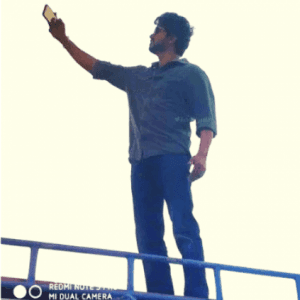 Master Vijay's Mass Selfy with Fans standing on top of a Van