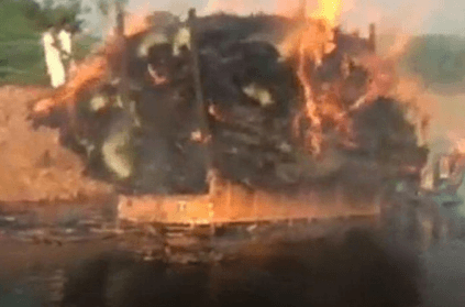 Farmer saves 100 houses by driving burning tractor into lake