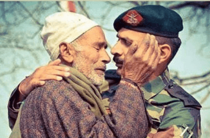 Indian army officer consoles father of martyred soldier