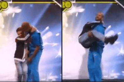 Shikhar Dhawan lifts boy during Man of the series award