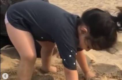MS Dhoni, Ziva playing with sand on chennai beach video goes viral