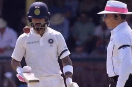 Umpire gets tempered after Kohli\'s act with the ball viral video