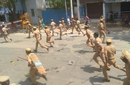 Police jump walls to escape from stone pelting in Thoothukudi protest